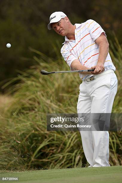 Brent McCullough of Australia pitches on the thirteenth hole during the Australasia International Final Qualifying for The 2009 Open Championship at...