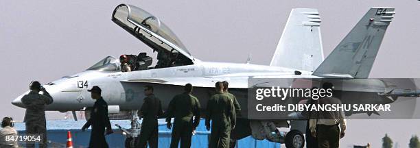 Navy F/A-18F Super Hornet strike aircraft taxis on the tarmac after a flight demonstration at the Yelahanka Air Force Station in Bangalore on...