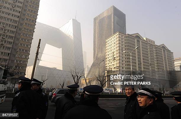 View from outside the burnt-out Mandarin Oriental Hotel the day after a huge fire engulfing the building in Beijing on February 10, 2009. A...