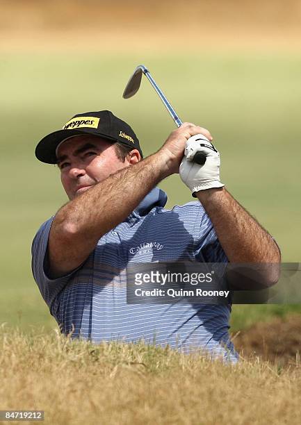 Craig Parry of Australia plays out of the bunker on the tenth hole during the Australasia International Final Qualifying for The 2009 Open...