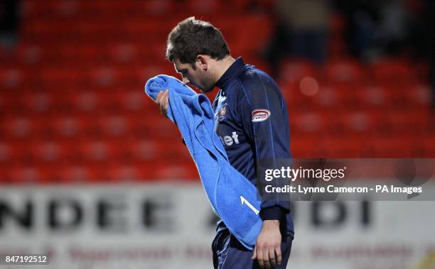 Kilmarnock's Cameron Bell reacts after losing during the Clydesdale Bank Scottish Premier League match at Tannadice Stadium, Dundee.