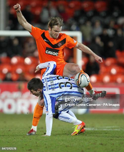 Dundee United's Robbie Neilson and Kilmarnock's Matthew Kennedy during the Clydesdale Bank Scottish Premier League match at Tannadice Stadium, Dundee.