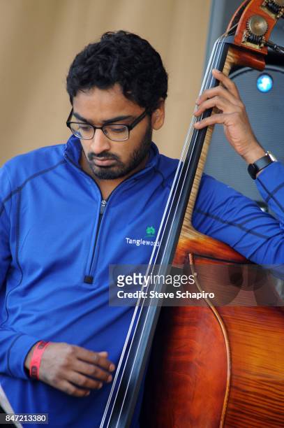 American Jazz musician Harish Raghavan plays upright acoustic bass as he performs onstage during a soundcheck before the Chicago Jazz Festival in...