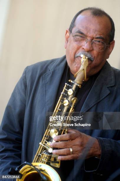 American Jazz musician Ernie Watts plays saxophone as he performs onstage during a soundcheck before the Chicago Jazz Festival in Grant Park,...