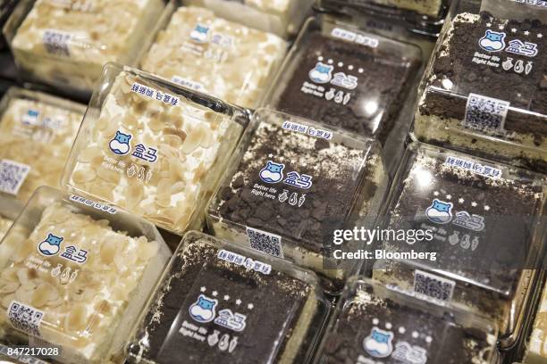 Pastries sit on display at an Alibaba Group Holding Ltd. Hema Store in Shanghai, China, on Tuesday, Sept. 12, 2017. Hema stores are one-stop shops...