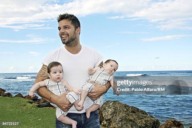 Ricky Martin poses with sons Valentino Martin and Matteo Martin on November 19, 2008 in San Juan, Puerto Rico.