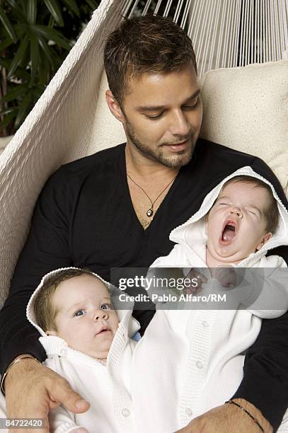 Ricky Martin poses with sons Matteo Martin and Valentino Martin on November 12, 2008 in Miami, Florida.