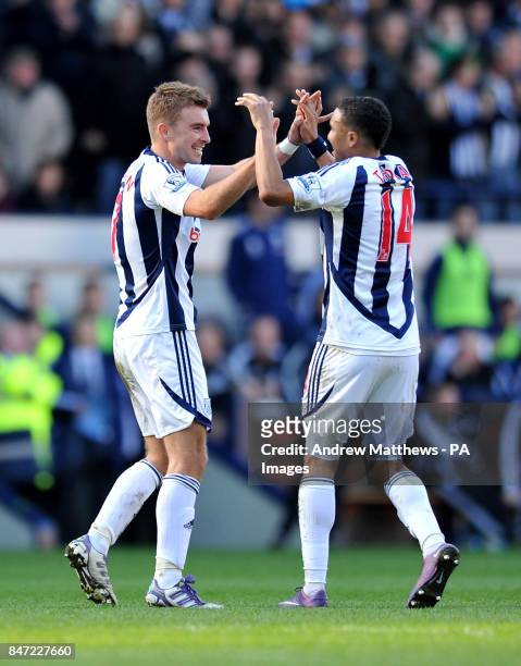 West Bromwich Albion's James Morrison celebrates with team mate Jerome Thomas after he scores their side's second goal of the game during the...