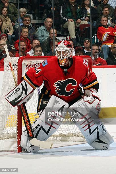 Miikka Kiprusoff of the Calgary Flames skates in net against the Chicago Blackhawks on February 5, 2009 at Pengrowth Saddledome in Calgary, Alberta,...