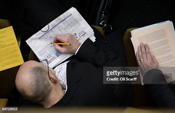 An attendee of the Church of England General Synod completes a SuDoku Puzzle whilst listening to the Synod debate in Church House on February 10,...