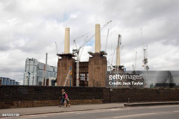 Cranes tower over the Battersea Power Station development July 21, 2017 in London, England. Over the last decade the landscape of South London has...