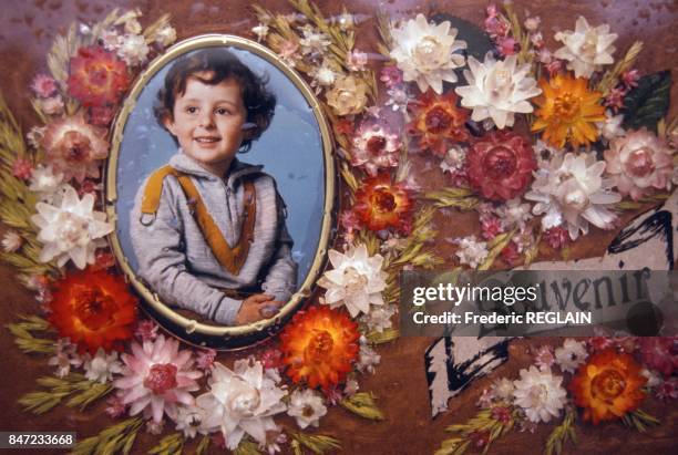 Portrait of Gregory Villemin on commemorative plaque on his grave the day of the 3rd anniversary of his murder at age 4 on October 16, 1987 in France.