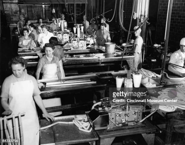 Employees at hotdog maker Kahn's & Company working the production line, Cincinnati, Ohio, 1950.