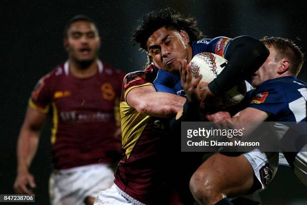 Malakai Fekitoa of Auckland is tackled by Tim Boys of Southland during the round five Mitre 10 match between Southland and Auckland at Rugby Park...