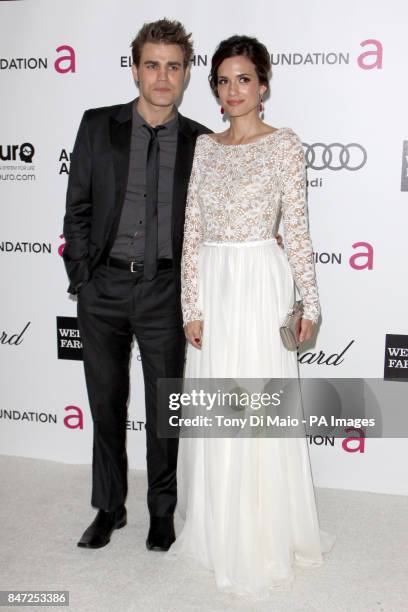 Paul Wesley and Torrey DeVitto arriving for the Elton John Aids Foundation Academy Awards Viewing Party at West Hollywood Park in Los Angeles, USA.