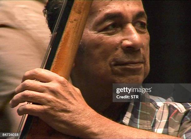 File picture taken in 2007 shows Cuban bass player Orlando 'Cachaito' Lopez performing during a concert in Havana. "Cachaito" Lopez, famed for his...