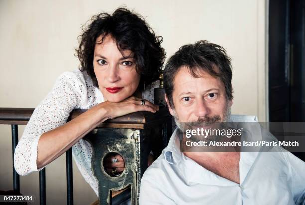 Actors Jeanne Balibar and Mathieu Amalric are photographed for Paris Match on August 28, 2017 in Paris, France.