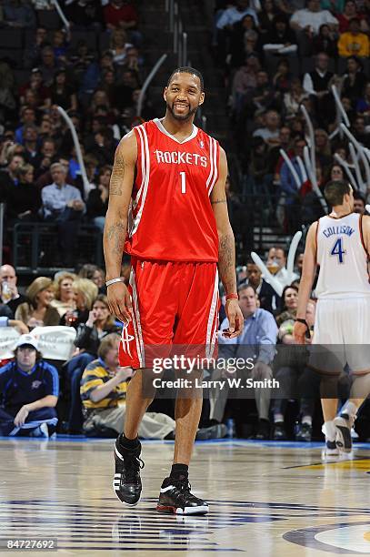 Tracy McGrady of the Houston Rockets cracks a smile during the game against the Oklahoma City Thunder at the Ford Center on January 9, 2009 in...