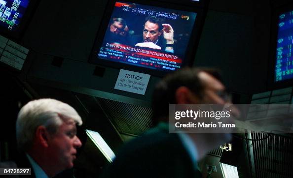 Ian Geithner Traders work on the floor of the New York Stock Exchange during... News ...