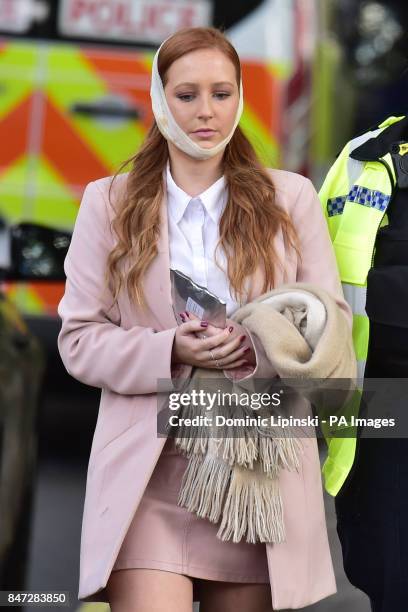 An injured woman close to Parsons Green station in west London after an explosion on a packed London Underground train.