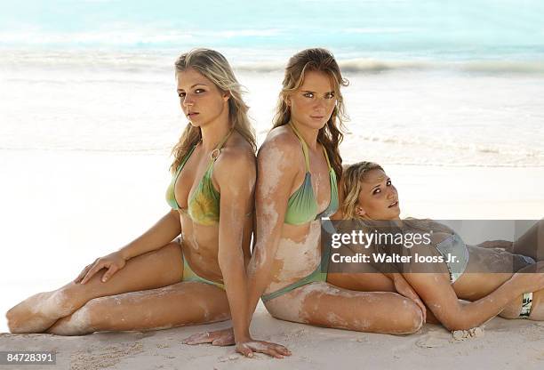 Swimsuit Issue 2009: Tennis players Maria Kirilenko, Daniela Hantuchova and Tatiana Golovin pose for the 2009 Sports Illustrated swimsuit issue on...