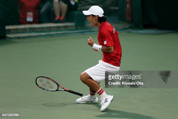 Go Soeda of Japan celebrates after winning his singles match against Thiago Monteiro of Brazil during day one of the Davis Cup World Group Play-off...