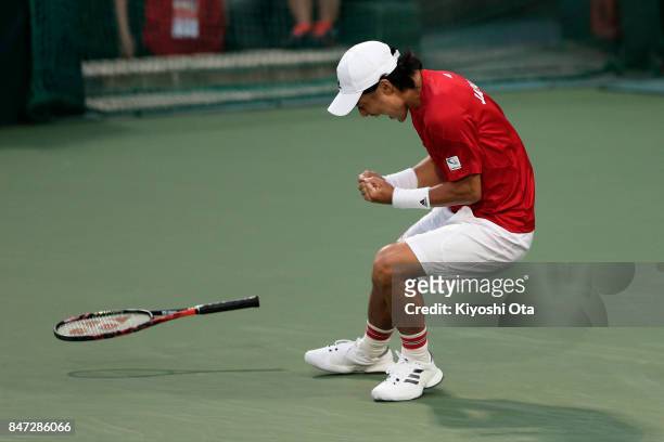 Go Soeda of Japan celebrates after winning his singles match against Thiago Monteiro of Brazil during day one of the Davis Cup World Group Play-off...