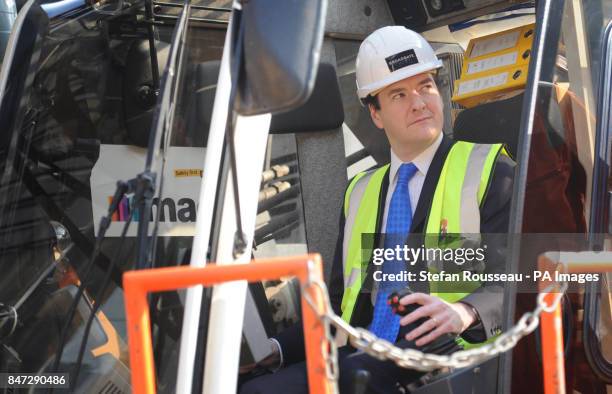 Chancellor George Osborne helps to start work on the new 5 Broadgate development in the City Of London today where new offices for UBS will be built.