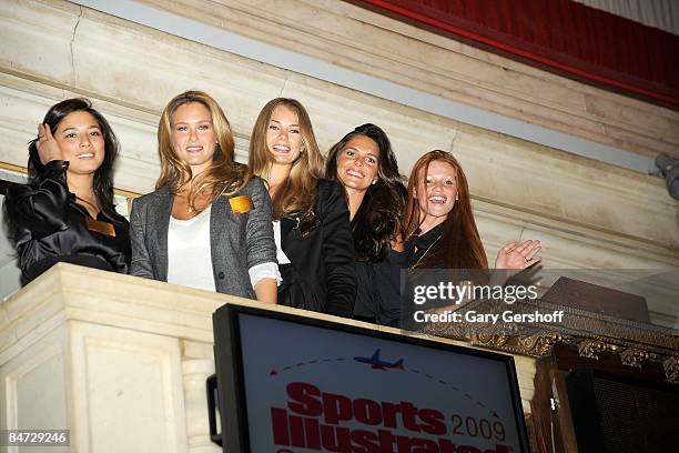 Sport Illustrated swimsuit models Jessica Gomes, Bar Refaeli, Tori Praver,Daniella Sarahyba, and Cintia Dicker ring the closing bell at the New York...