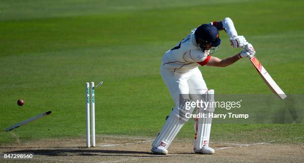 Kyle Jarvis of Lancashire is bowled by Craig Overton of Somerset during Day Four of the Specsavers County Championship Division One match between...