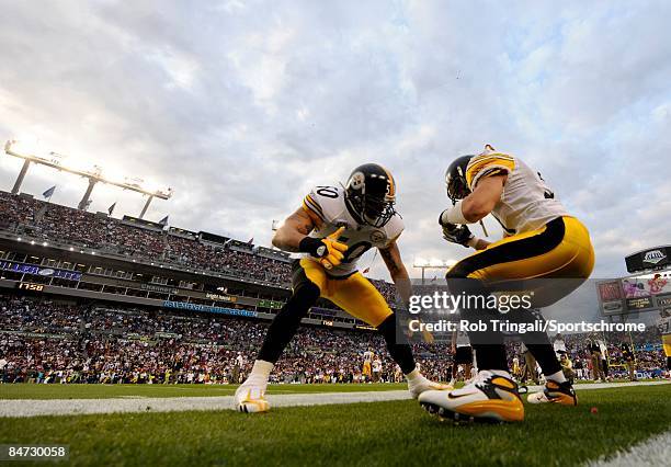 Linebacker Larry Foote of the Pittsburgh Steelers dances during pregame before a game against the Arizona Cardinals during Super Bowl XLIII on...