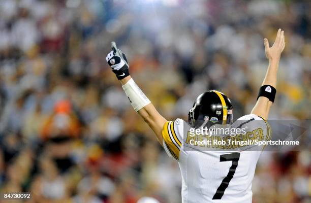 Quarterback Ben Roethlisberger of the Pittsburgh Steelers gestures a touchdown signal against the Arizona Cardinals during Super Bowl XLIII on...