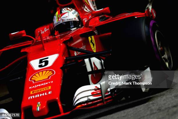 Sebastian Vettel of Germany driving the Scuderia Ferrari SF70H on track during practice for the Formula One Grand Prix of Singapore at Marina Bay...