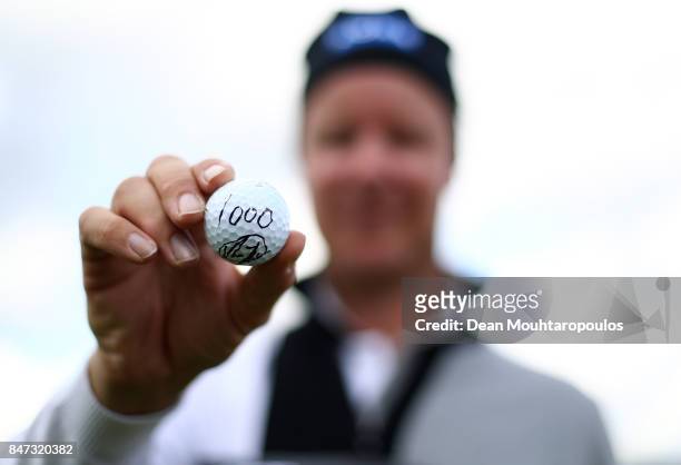Miko Ilonen of Finland poses for a picture after hitting the 1000th European Tour hole in one on the 14th hole during day two of the KLM Open at The...