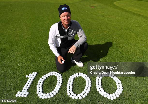 Miko Ilonen of Finland poses for a picture after hitting the 1000th European Tour hole in one on the 14th hole during day two of the KLM Open at The...