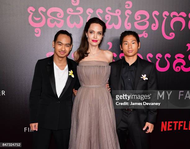Maddox Jolie-Pitt, Angelina Jolie and Pax Jolie-Pitt arrive to the DGA Theater for the New York premiere of 'First They Killed My Father' on...