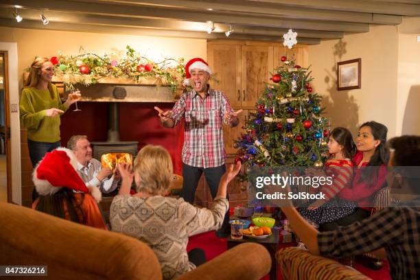 quality time at christmas - pantomime stock pictures, royalty-free photos & images