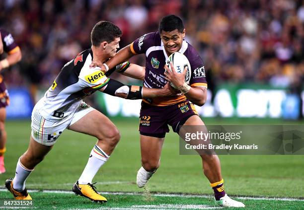 Anthony Milford of the Broncos attempts to break away from the defence during the NRL Semi Final match between the Brisbane Broncos and the Penrith...