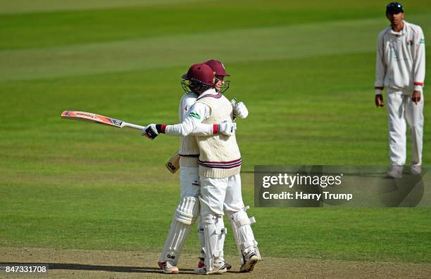 George Bartlett and Tom Abell of Somerset celebrate victory during Day Four of the Specsavers County Championship Division One match between Somerset...