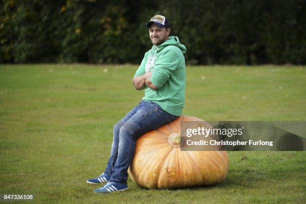 Giant vegetable grower Richard Mann from Leeds from poses with his giant award winning pumpkin that weighed in at 310.71kg at the Harrogate Autumn...