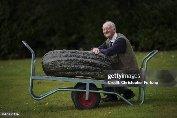 Giant vegetable grower Peter Glazebrook from Newark poses with his giant award winning marrow that weighed in at 66.8kg at the Harrogate Autumn...