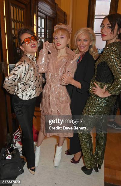 Jaime Winstone, Ellie Rae Winstone, Elaine Winstone and Lois Winstone pose backstage at the Pam Hogg SS18 catwalk show during London Fashion Week...