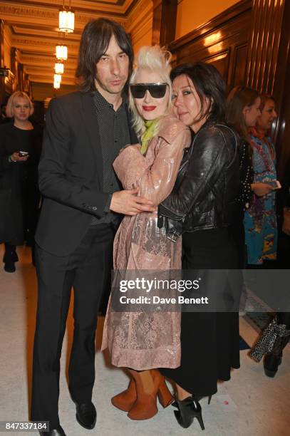 Bobby Gillespie, Pam Hogg and Katy England pose backstage at the Pam Hogg SS18 catwalk show during London Fashion Week September 2017 on September...