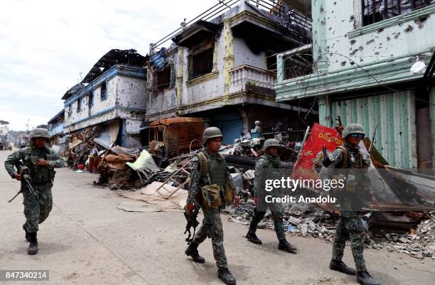 Members of the Philippine Marines 1st Brigade conduct clearing operation at the main battle zone to liberate the ruined city from the presence of...