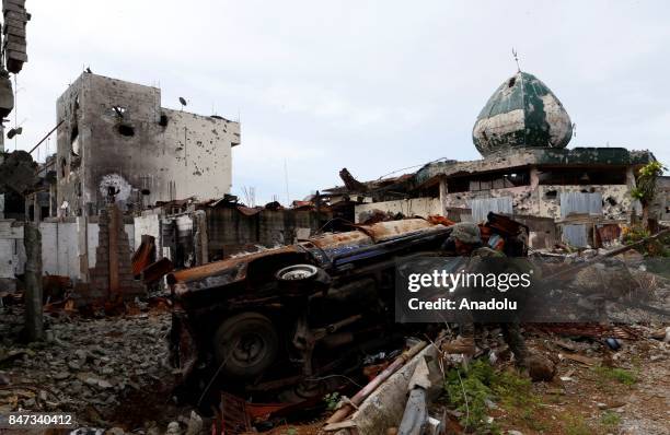 Members of the Philippine Marines 1st Brigade conduct clearing operation at the main battle zone to liberate the ruined city from the presence of...