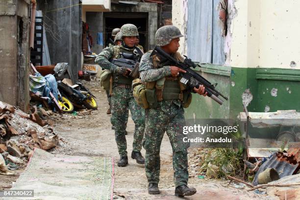 Members of the Philippine Marines 1st Brigade conduct clearing operation at the main battle zone to liberate the ruined city from the presence of...