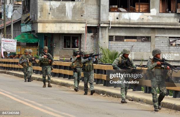 Members of the Philippine Marines 1st Brigade conduct clearing operation at the main battle zone to liberate the ruined city from the presence of...