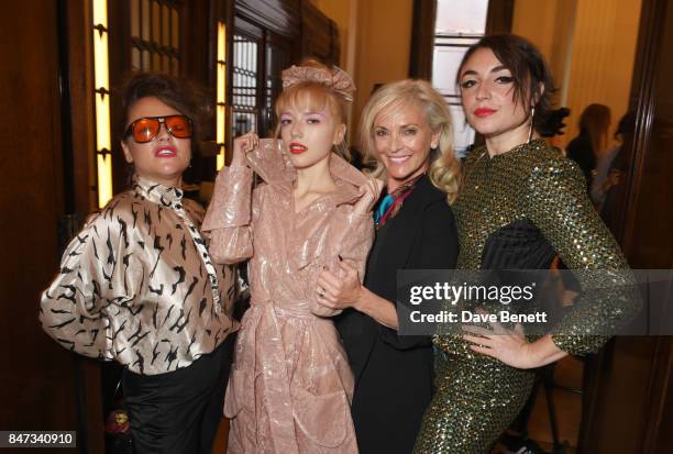 Jaime Winstone, Ellie Rae Winstone, Elaine Winstone and Lois Winstone pose backstage at the Pam Hogg SS18 catwalk show during London Fashion Week...