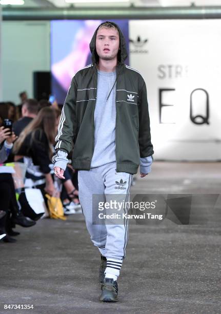 Rafferty Law walks the runway of the Streets of EQT Fashion Show at The Old Truman Brewery on September 15, 2017 in London, England. Hailey Baldwin...