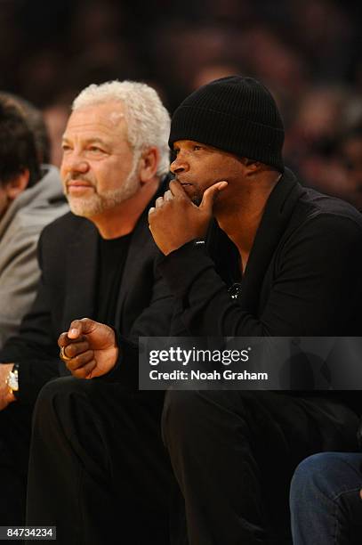 Actor Damon Wayans watches a game from courtside between the Oklahoma City Thunder and the Los Angeles Lakers at Staples Center on February 10, 2009...